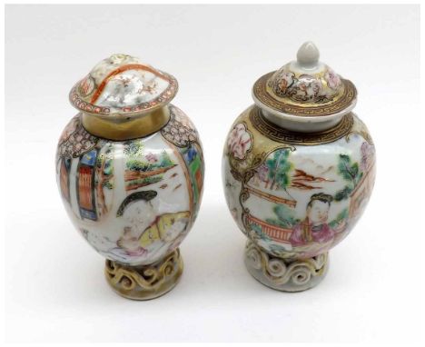 Two Chinese Covered Baluster Vases, of circular form, each painted in colours with scenes of figures and raised on scroll mou