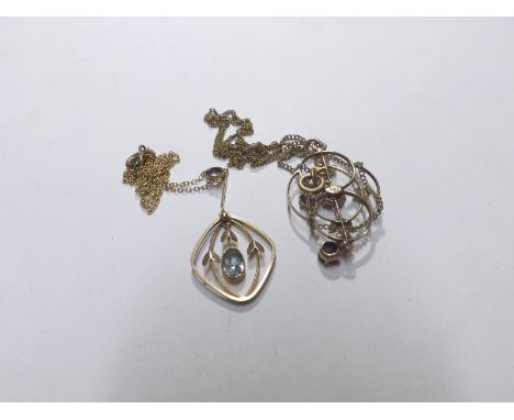 Edwardian yellow metal open work Pendant with blue stone swinger to the centre, articulated blue stone mounted hanger, total 