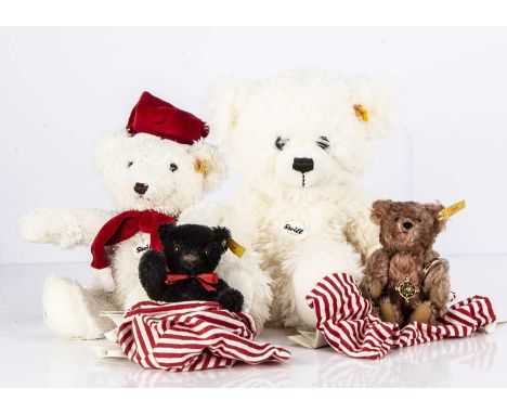 Four Steiff yellow tag teddy bears,  including a Classic Miniature Teddy Bears US special 1995, rose mohair with metal compas