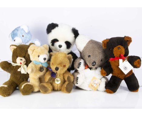 Seven manufactured teddy bears with interesting and original tags, including a Happy Child Toys, with light brown plush, oran