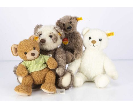 Four Steiff yellow tag teddy bears,  including a Original Pelle Panda-- 14in. (36cm.) high; a Classic Teddy Bear, with brown 