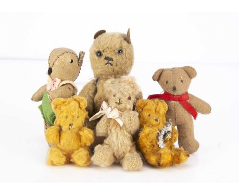 Six miniature teddy bears,  including a Chad Valley Father Bear, (with replacement arm)-- 5in.(12.5cm.) high; two golden cott