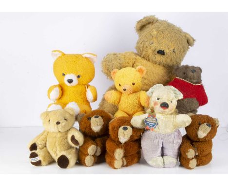 Twenty six vintage Chad Valley teddy bears, including an unjointed yellow and purple mohair, with blue and black plastic eyes