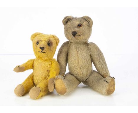A 1920's Chad Valley teddy bear,   with blonde mohair, orange and black glass eye (chipped, other missing), black stitched no