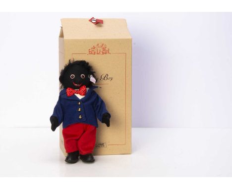 A Steiff limited edition Golly Boy, 709 of 2000 for the year 2001, in original box with certificate (slight smoke aroma) *The
