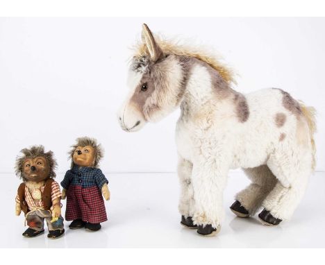 A large post-war Steiff draylon Sheddy Shetland pony 1960s,  with script button —16in. (41cm.) long; and a Mecki and Micki He