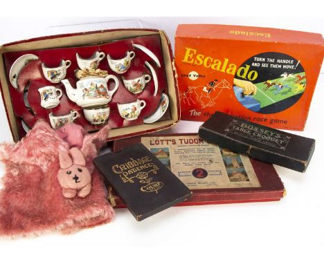 A child’s transfer printed tea set,  featuring fairy tales including The Three Bears, in original box base; a pink mohair nig