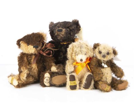 Four Merrythought teddy bears, including Alexander 18 of 100, made for the Heritage Bear Company, with unusual blue-brown fle