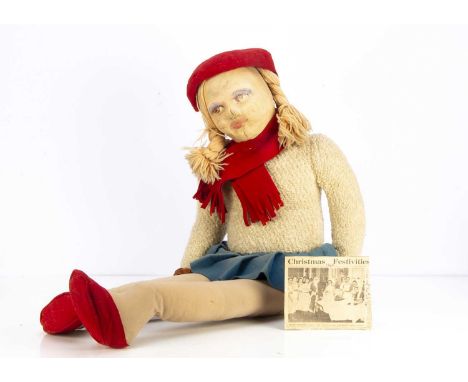 A large Dean’s Rag Book Coronation cloth doll with provenance, with wool hair, red felt beret, scarf and shoes, blue felt ski