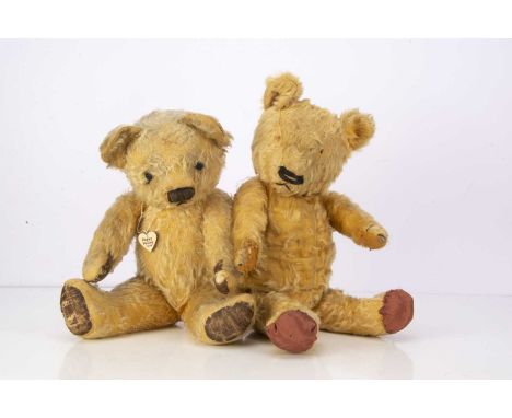 Two Chad Valley teddy bears,  including a 1930's Manga type-- 21 1/2in. (54.5cm) high; and a later 1950's bear, both with gol