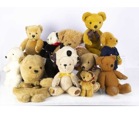 Eight modern Merrythought teddy bears,  including a Hamleys teddy bear-- 17in. (43cm.) high, a pilot bear, a panda bear, a vi