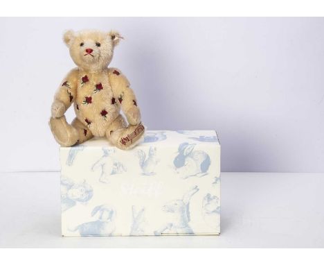 A Steiff limited edition Musical Jerusalem teddy bear, made exclusively for the UK and Ireland, embroidered with red roses an