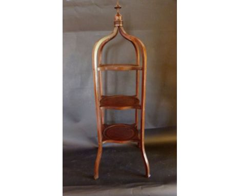 An Edwardian Mahogany Line Inlaid Three Tier Cake Stand, with a turned finial and outswept legs, 96 cms high