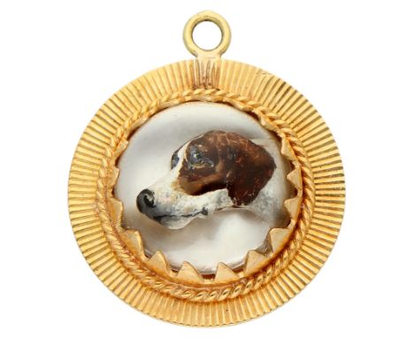 18K yellow gold ‘Reversed intaglio’ pendant of a dog's head  Part of a demi-parure. So-called reverse intaglio of a coloured 