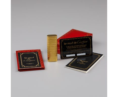Cartier gas lighter Model enriched gold plating and original box France, Paris, Must de Cartier, hallmarks: Must de Cartier -
