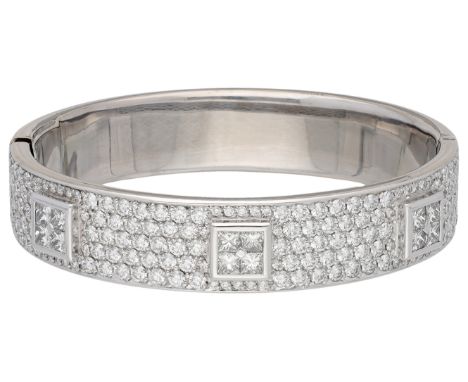 18K white gold bangle bracelet set with approx. 7.42 ct. diamond Set with 157 brilliant and 12 princess cut diamonds totallin