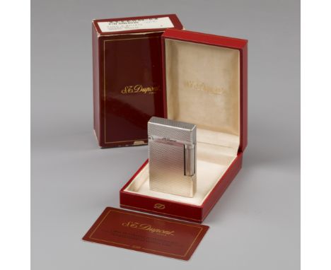 S.T. Dupont gas lighter Model enriched with silver plating and original box. France, Paris, S.T. Dupont, hallmarks: S.T. Dupo