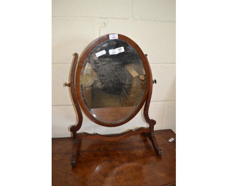 EARLY 20TH CENTURY BEVELLED GLASS OVAL SWING MIRROR, 58CM HIGH
