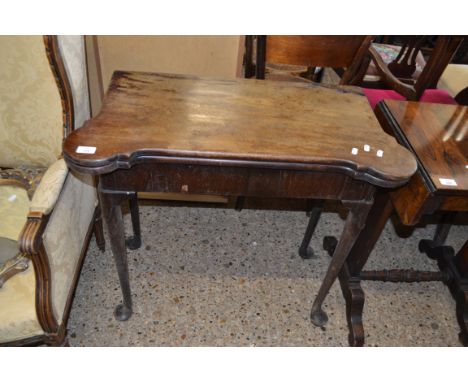 GEORGE III MAHOGANY FOLDING CARD TABLE WITH BAIZE LINED INTERIOR RAISED ON TAPERING LEGS AND PAD FEET, (A/F)