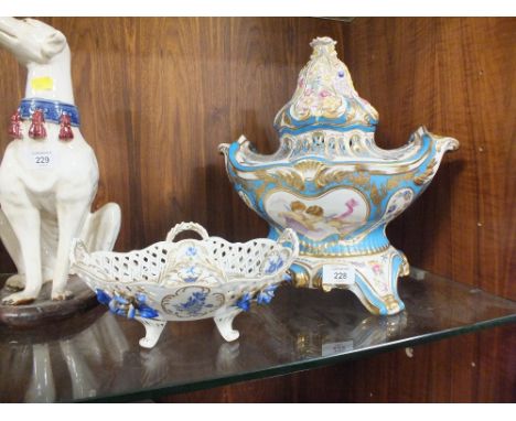 A CONTINENTAL PIERCED CERAMIC BASKET TOGETHER WITH A CONTINENTAL LIDDED TUREEN 