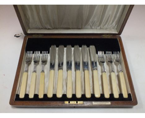 A CANTEEN OF HALLMARKED SILVER BONE HANDLED FLATWARE