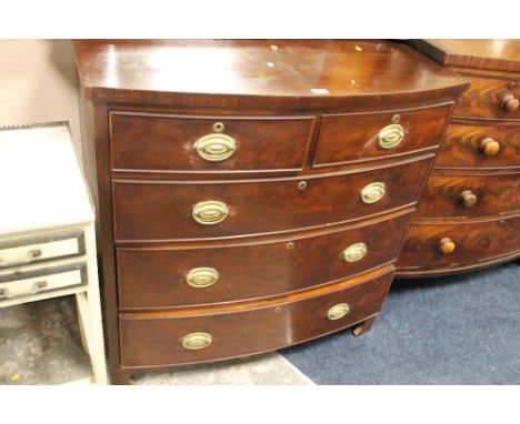 A 19TH CENTURY MAHOGANY BOW FRONTED CHEST OF FIVE DRAWERS