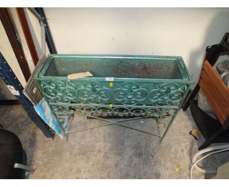 A FLOWER TROUGH IN STAND PLUS TWO WALL MOUNTABLE  PLANT BASKETS