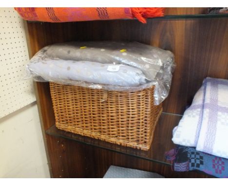 A HAMPER BASKET PLUS TWO PICNIC BLANKETS