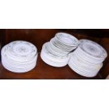 A Royal Doulton "Provencal" pattern dinner service, comprising twelve dinner plates, pudding