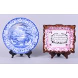 An early 19th century blue and white soup bowl, decorated with cattle, figures and buildings to