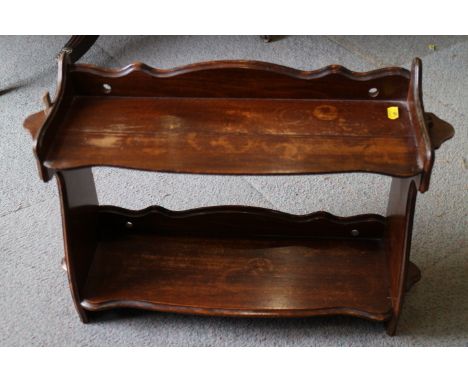 An early 20th century polished as walnut two-tier open wall shelf, 21" wide