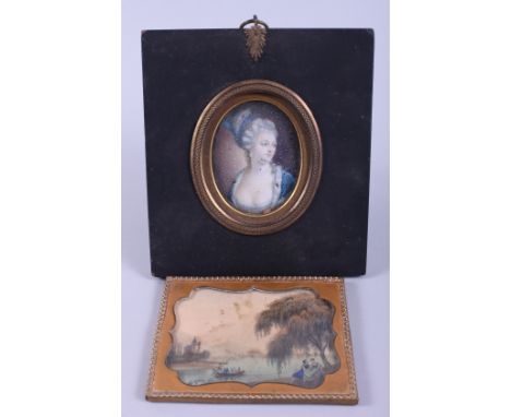 A 19th century oval miniature painting, portrait of a woman in a blue gown, in ebonised frame, and a landscape print, in gilt