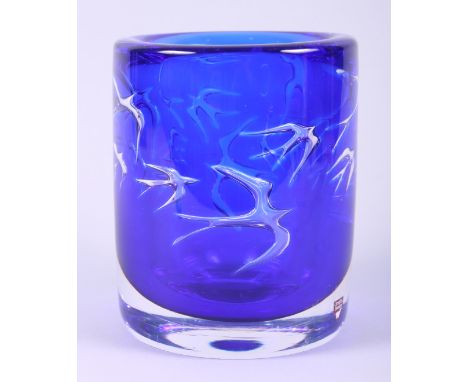 A blue glass vase, decorated with swifts, by Olle Alberius for Orrefors, 6 1/2" high Condition:Wear to base. The vase appears