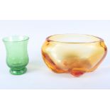 An orange glass vase and a mottled green glass vase