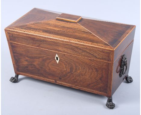 A rosewood and banded two-division tea caddy with lion face handles, 22" wide (damages)