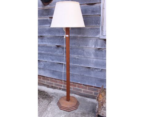 A light oak square-section standard lamp