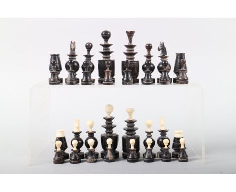 A 19th century horn and ivory chess set, king 2 7/8" tall