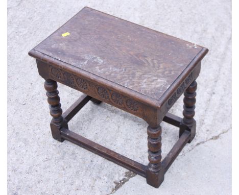 A 17th century design low oak occasional table, on bobbin turned supports, and another occasional table with rectangular shap