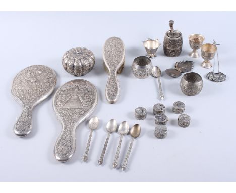 A Persian white metal dressing table set, a similar pepper grinder, a set of six white metal menu holders and various other E