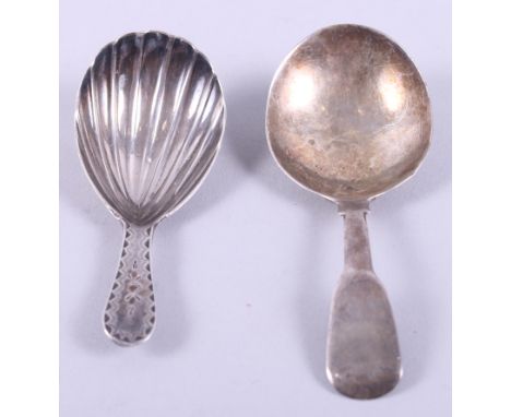 A silver caddy spoon with shell bowl and bright cut handle and a silver Fiddle pattern caddy spoon