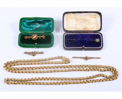 A Victorian gilt muff chain, the clasp formed as a hand, mounted single green stone, a 19th century 15ct gold bar brooch, set