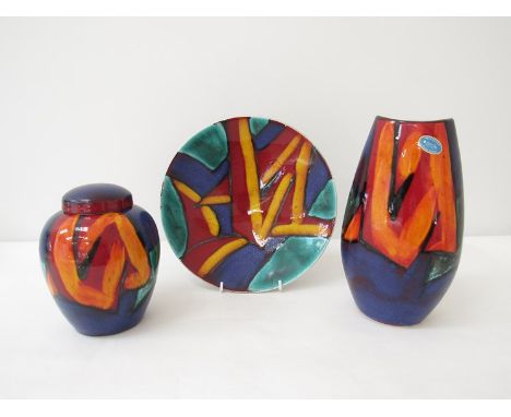 Three pieces of Poole Pottery "Graffiti" wares, Manhattan shape, ginger jar and shallow dish.  Largest 25cm high 