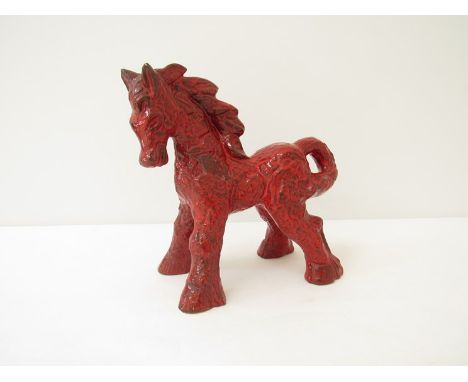 A Dutch Ceramic red glazed figure of a horse 26.5cm high 