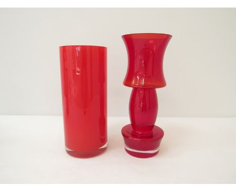 A Finnish ruby glass vase (chip to outer rim) and a red cylindrical art glass vase. Tallest 28cm