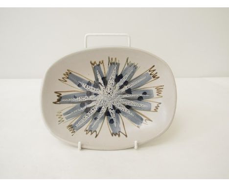 MARIANNE DE TREY (1913-2016) A studio pottery dish with starburst glaze design, impressed seal mark and pencil inscribed pric
