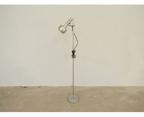 A chrome and aluminium standard lamp with single adjustable spot light 
