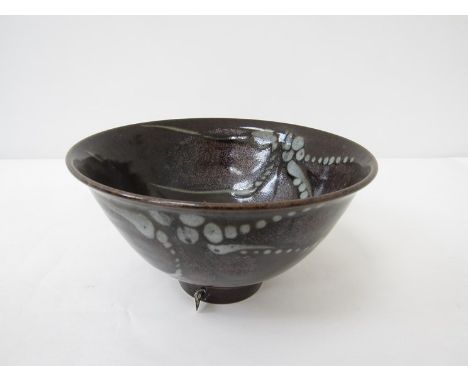 DAVID LLOYD JONES (1928-1994) A studio pottery bowl, dark tenmoku glaze with ash foliate detail. Impressed seal. 10cm high