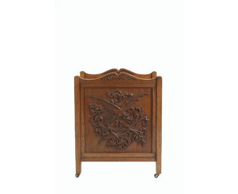 Arts and Crafts  Canterbury or magazine rack, oak, with carved decoration of a dragon  52cm x 68cm x 25cm 