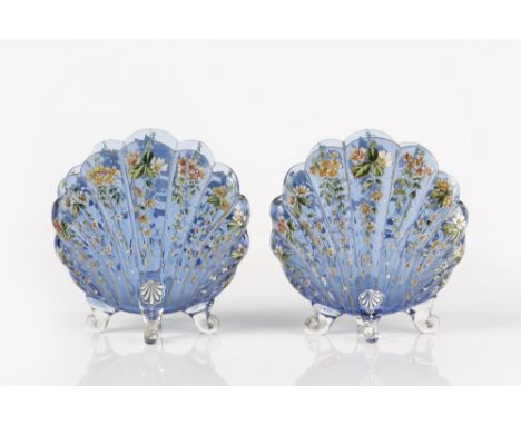In the manner of Ludwig Moser (1833-1916)  pair of blue enamel painted glass vases of shell form standing on scroll feet, uns