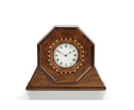 Attributed to Harry Davoll (British, 1876-1963) Cotswold School mantel clock, burr yew, white enamel dial with Roman numerals